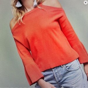 Knitted and knotted cold shoulder sweater